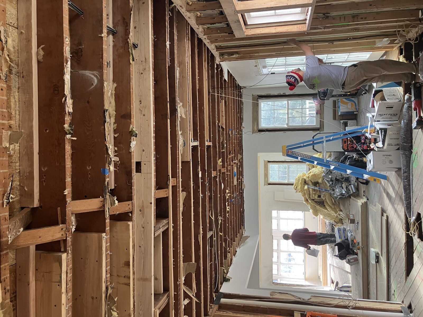 Georgian Colonial restoration at rough-in, speaker wire pulled through open joists