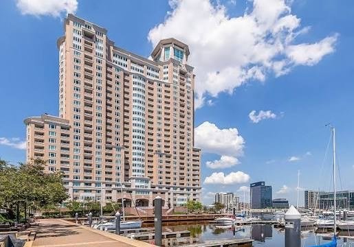 Baltimore harbor high-rise with the marina in front